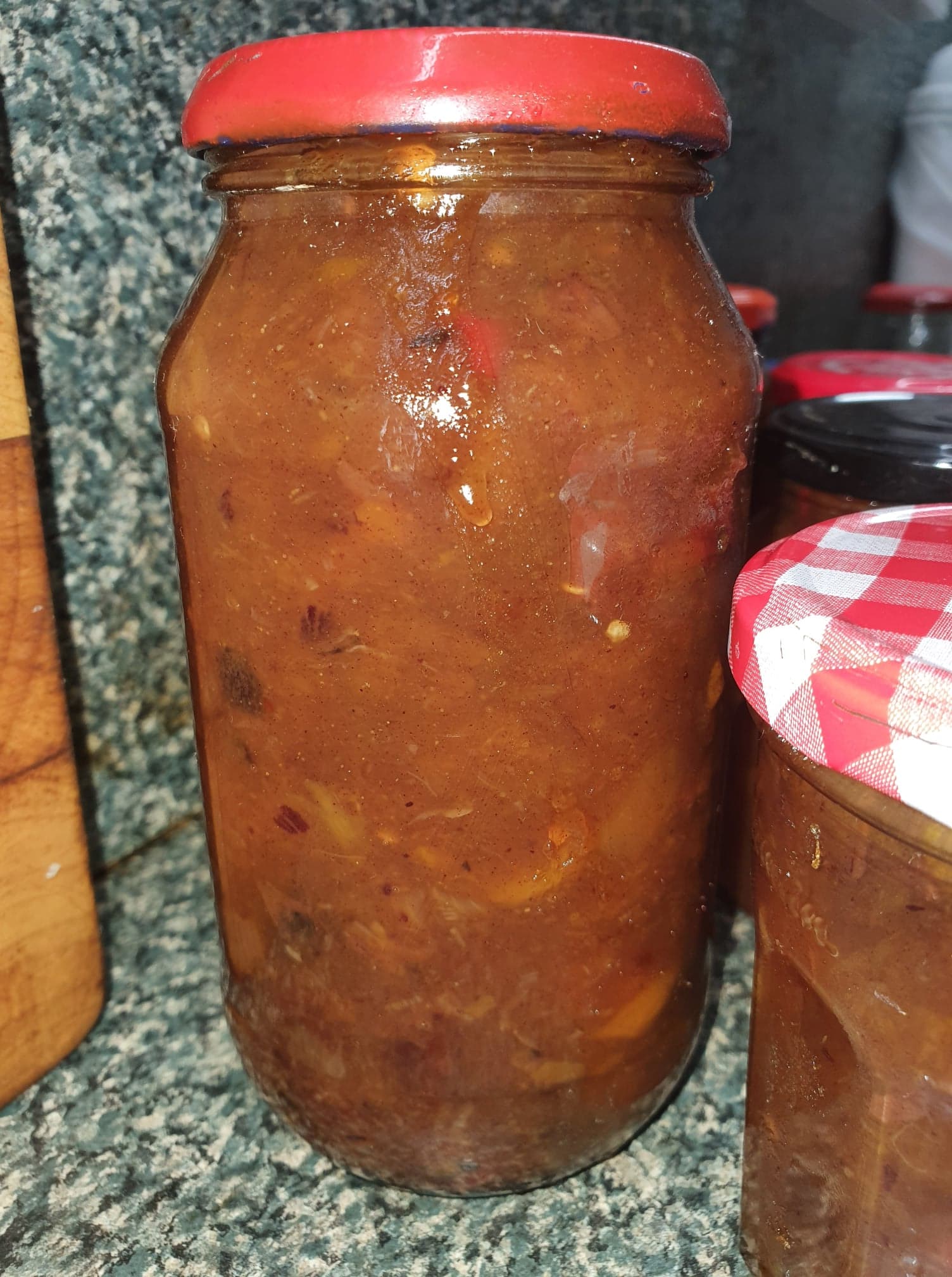 Serving suggestion of mango chutney with snacks